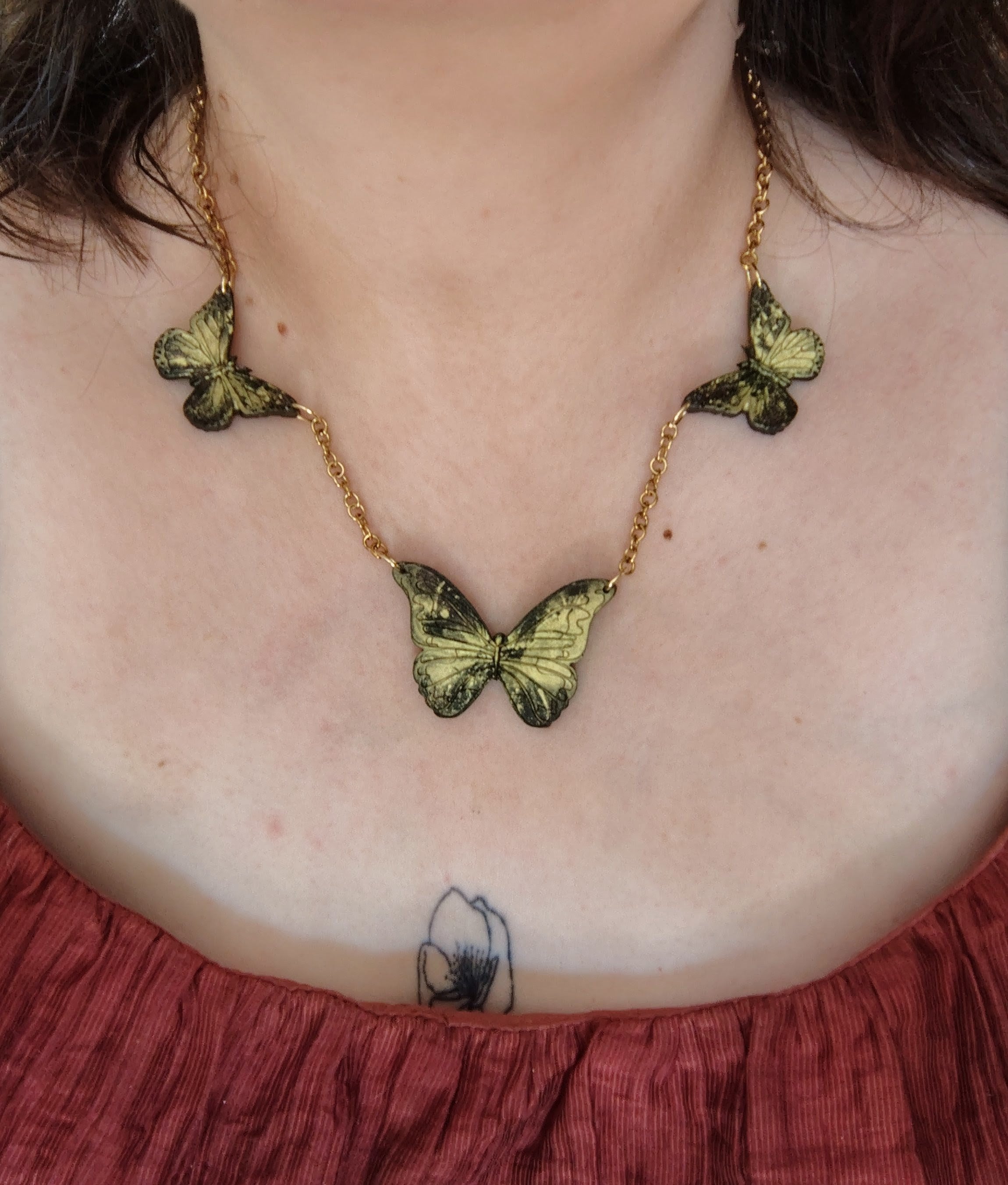 Colliers et boucles d'oreilles papillon