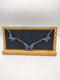 Collier Papillon en résine époxy fait main – Bijou féerique artisanal