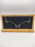 Collier Papillon en résine époxy fait main – Bijou féerique artisanal