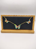 Collier Papillon en résine époxy fait main – Bijou féerique artisanal