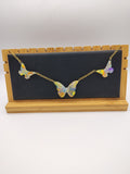 Collier Papillon en résine époxy fait main – Bijou féerique artisanal