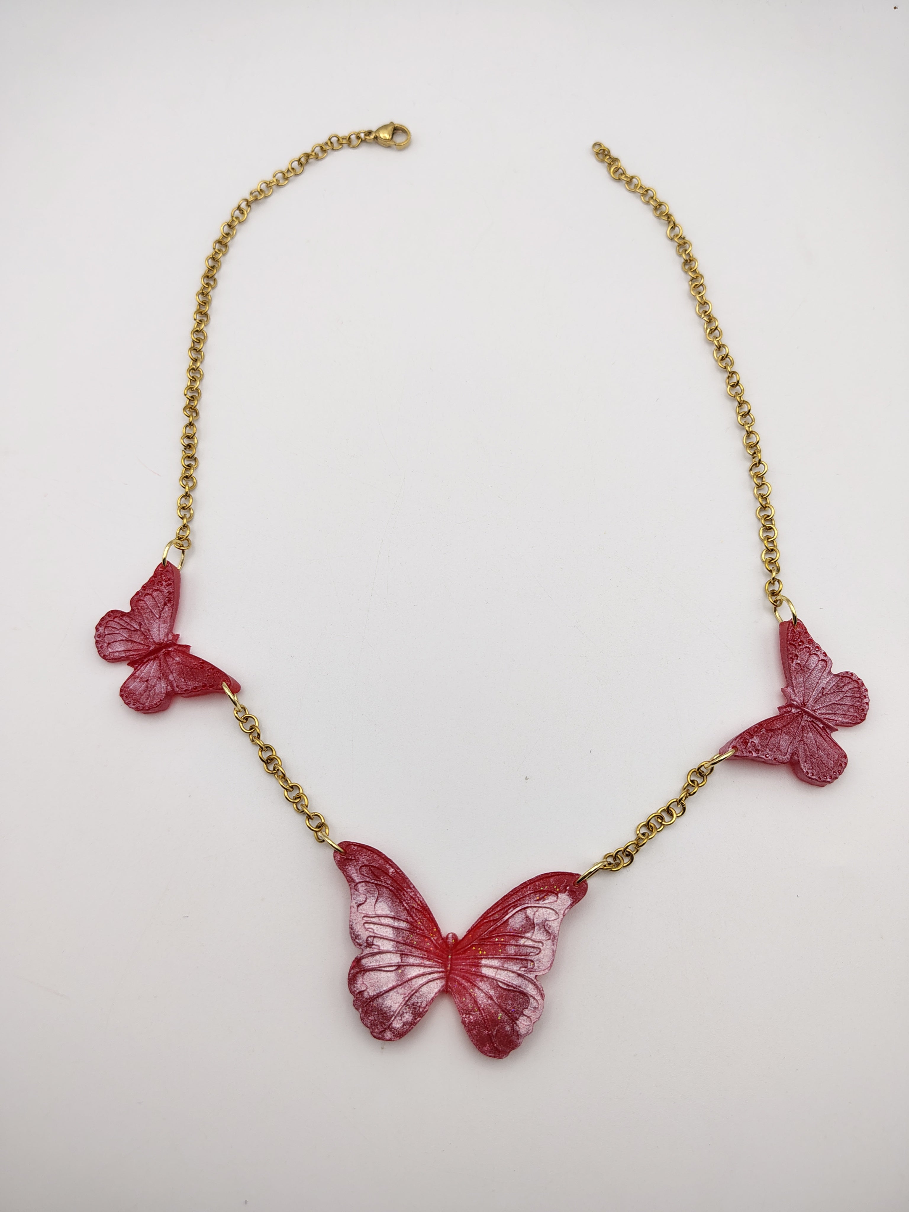 Collier Papillon en résine époxy fait main – Bijou féerique artisanal