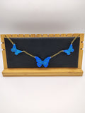 Collier Papillon en résine époxy fait main – Bijou féerique artisanal