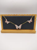 Collier Papillon en résine époxy fait main – Bijou féerique artisanal