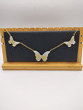 Collier Papillon en résine époxy fait main – Bijou féerique artisanal