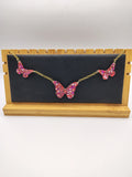 Collier Papillon en résine époxy fait main – Bijou féerique artisanal