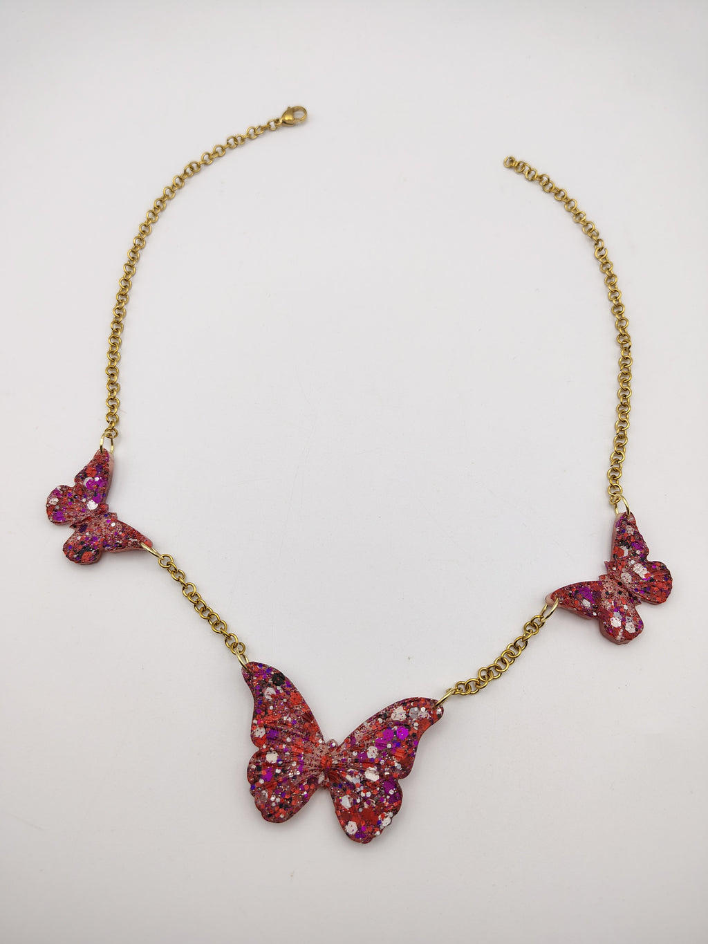 Collier Papillon en résine époxy fait main – Bijou féerique artisanal